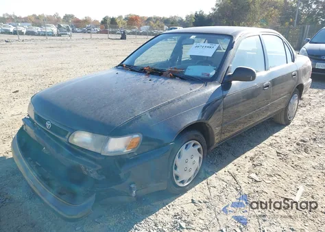1997 Toyota Corolla Std из США, поврежденный, VIN 2T1BA02E0VC162383